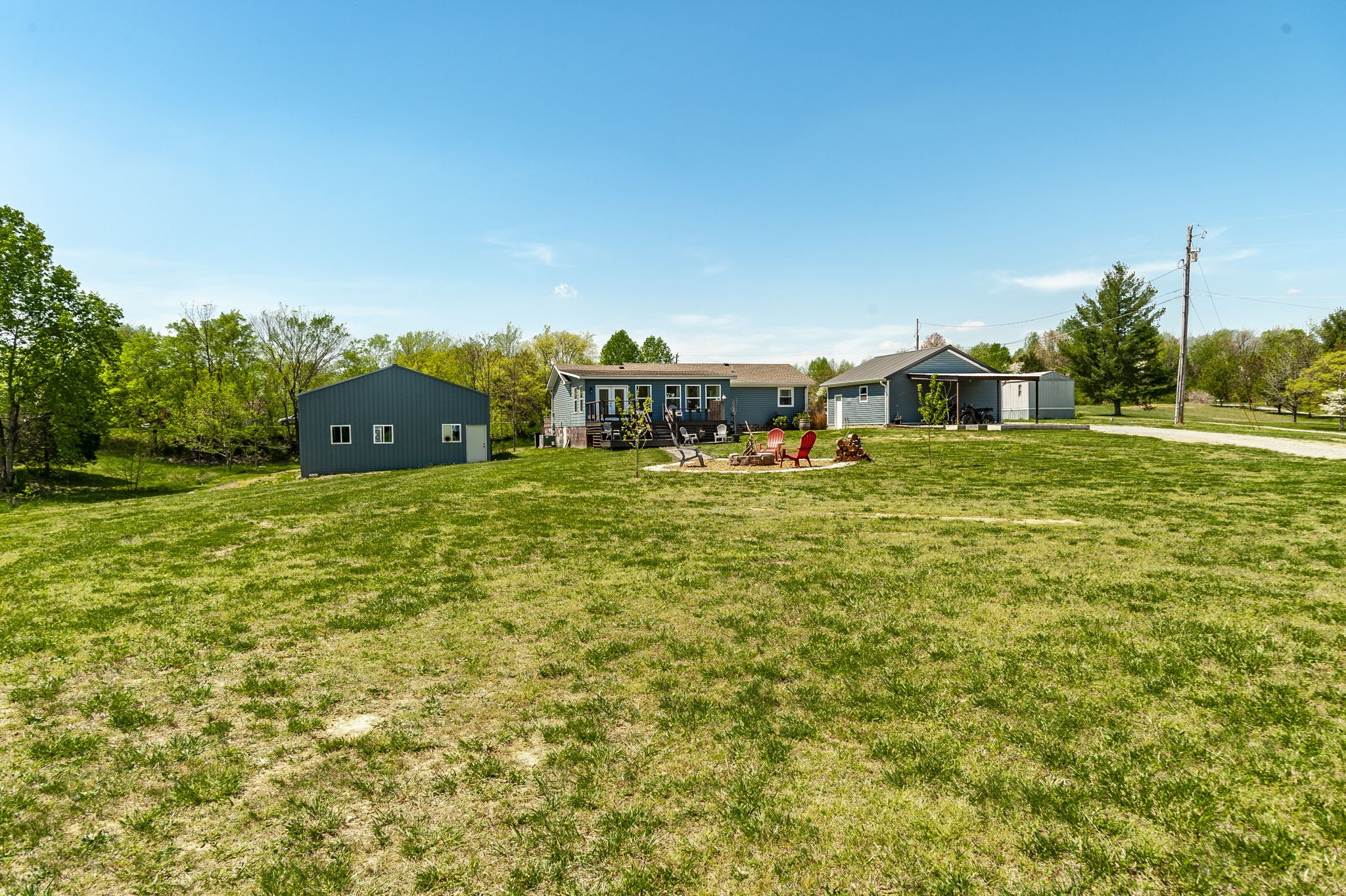 3014 Academy Road Portland, TN 37148 - Photo 32 of 42 a view of a town with large trees and plants
