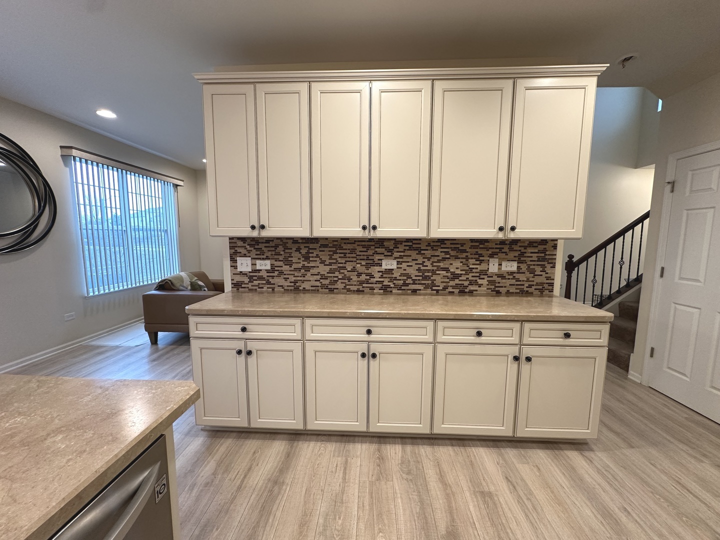 5102 Monroe Street Matteson, IL 60443 - Photo 18 of 54 a kitchen with granite countertop white cabinets and white appliances
