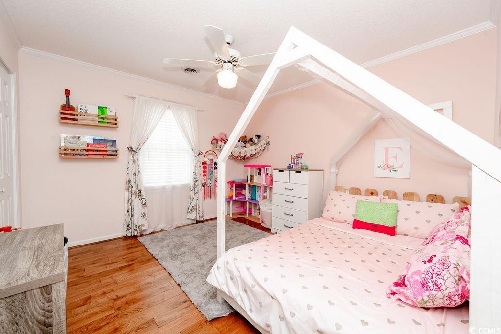 71 Great Lakes Road Pawleys Island, SC 29585 - Photo 23 of 32 Unfurnished sunroom with a wealth of natural light