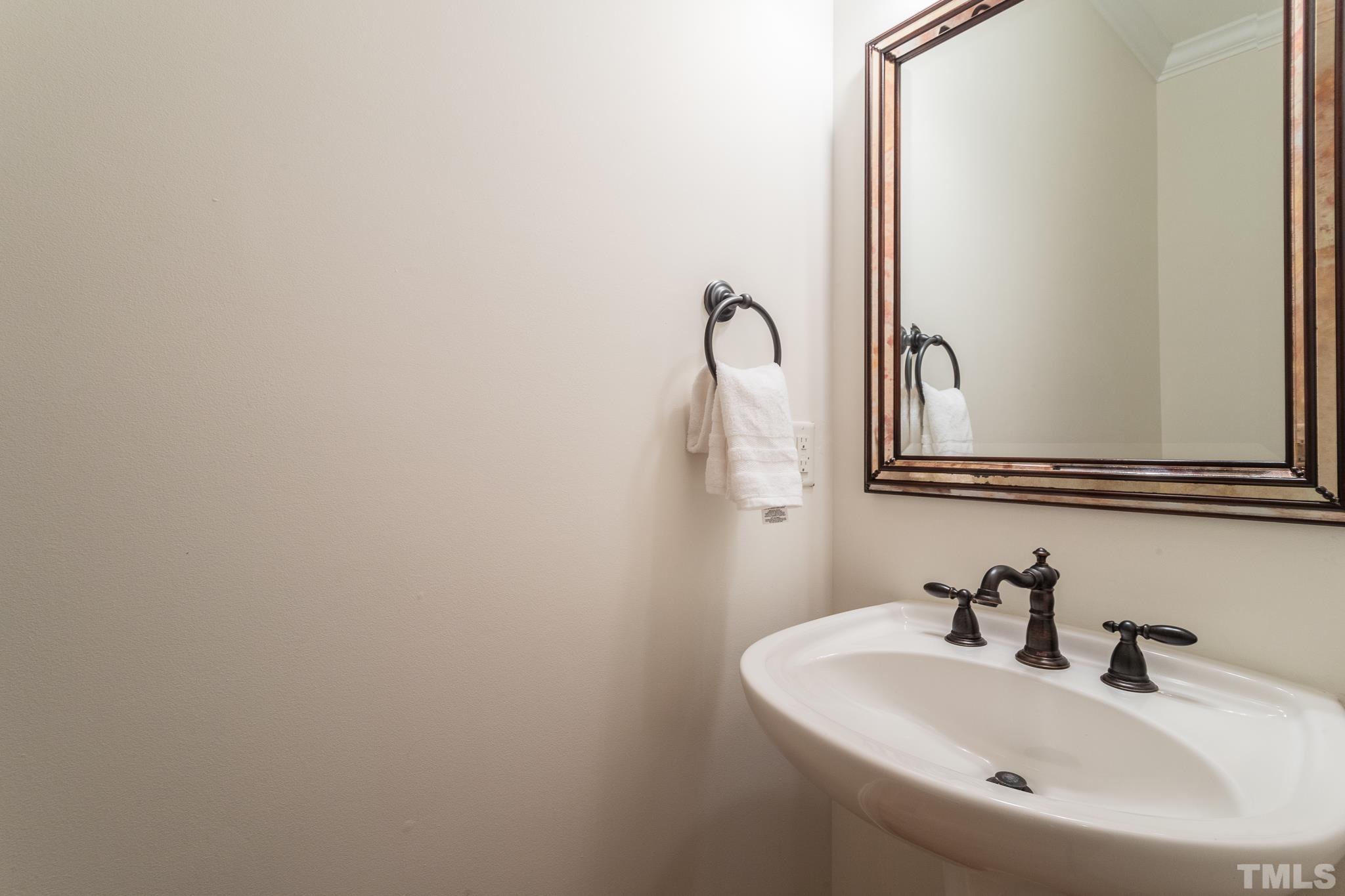 11625 John Allen Road Raleigh, NC 27614 - Photo 11 of 30 a bathroom with a sink and a mirror