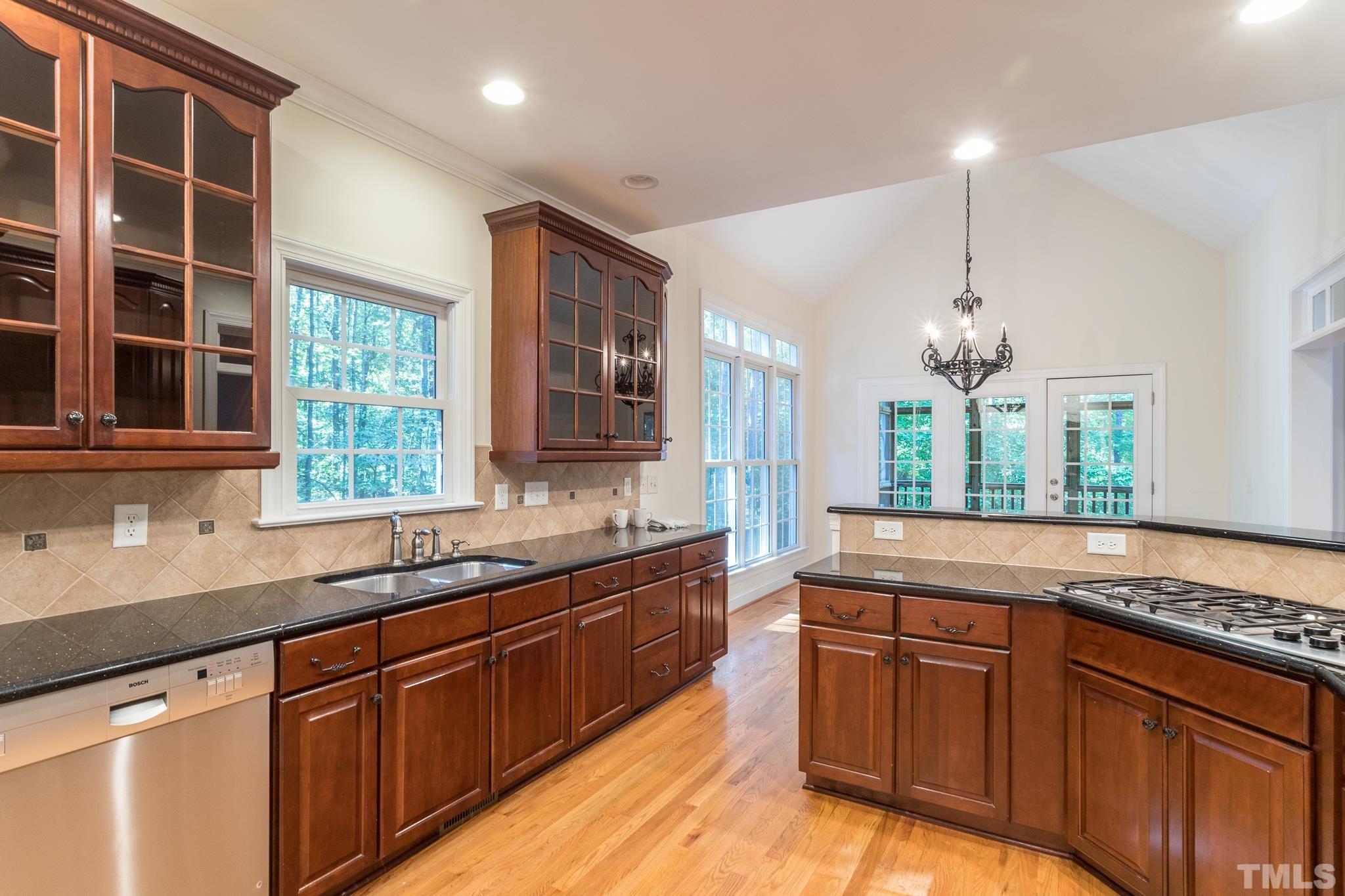 11625 John Allen Road Raleigh, NC 27614 - Photo 14 of 30 a kitchen with granite countertop stainless steel appliances sink and window