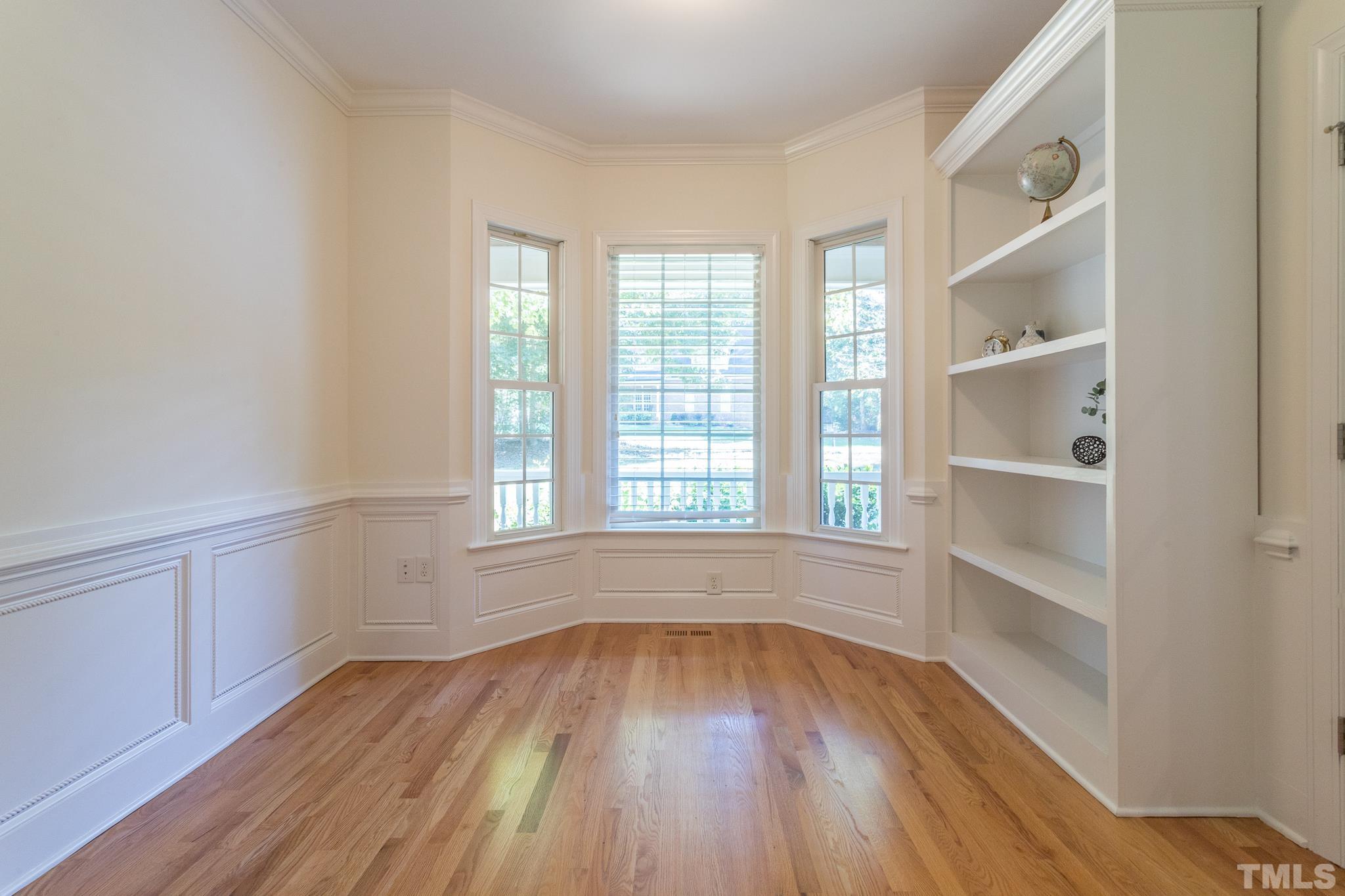11625 John Allen Road Raleigh, NC 27614 - Photo 22 of 30 a view of empty room with wooden floor and fan