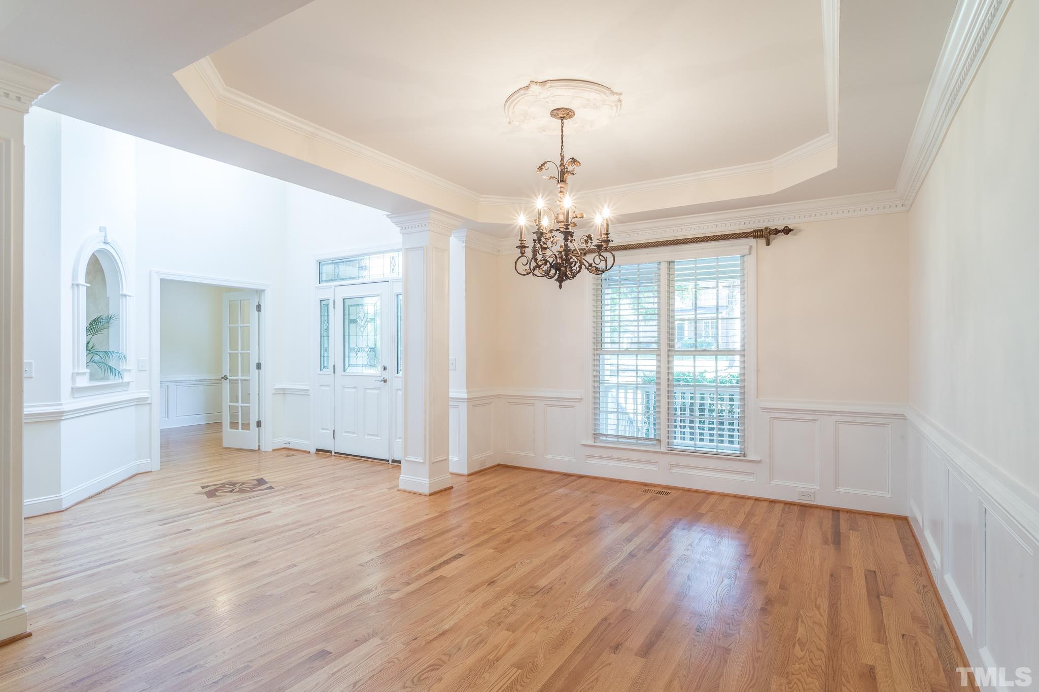 11625 John Allen Road Raleigh, NC 27614 - Photo 25 of 30 a view of a big room with wooden floor chandeliers and kitchen