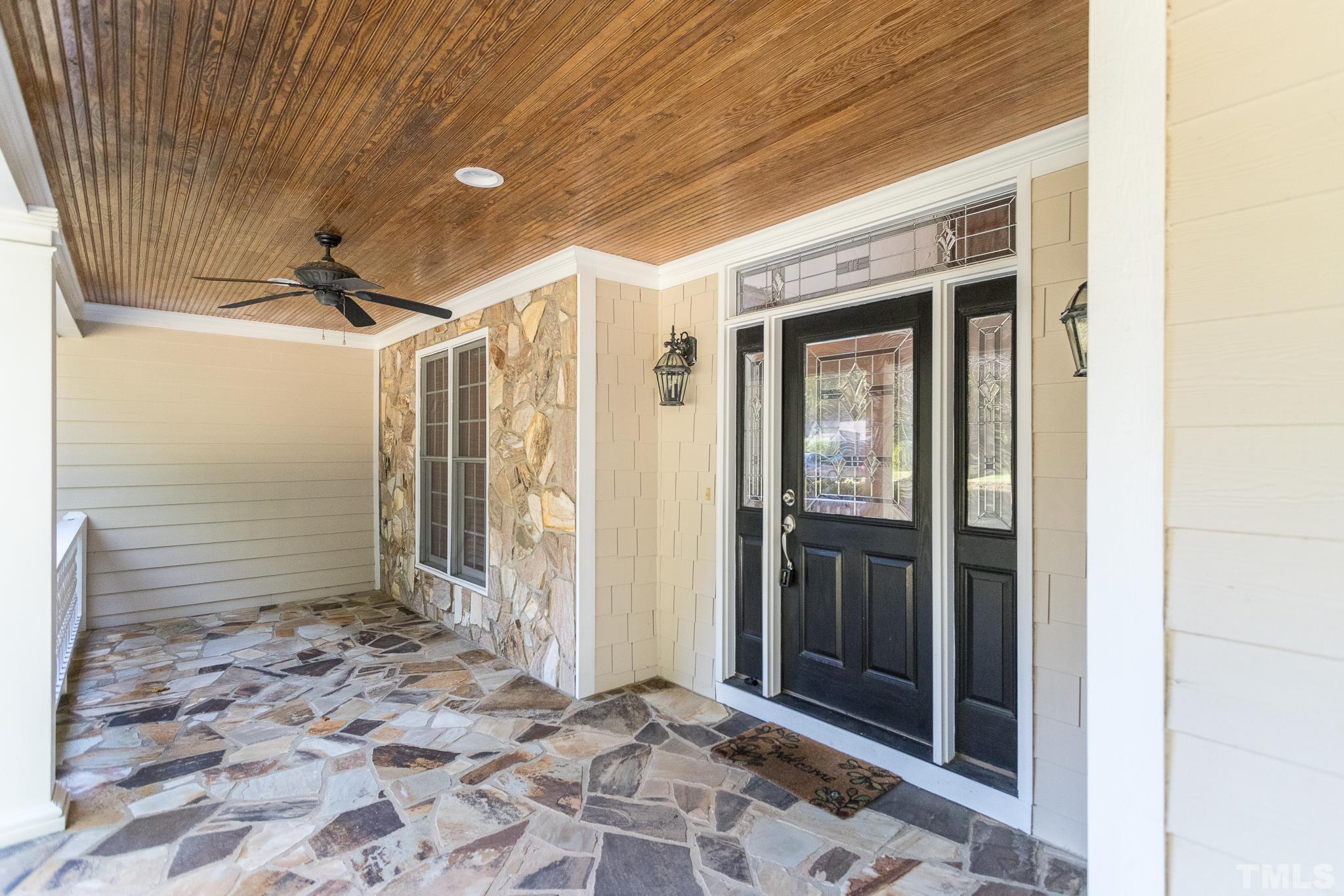 11625 John Allen Road Raleigh, NC 27614 - Photo 30 of 30 a view of a hallway with wooden door