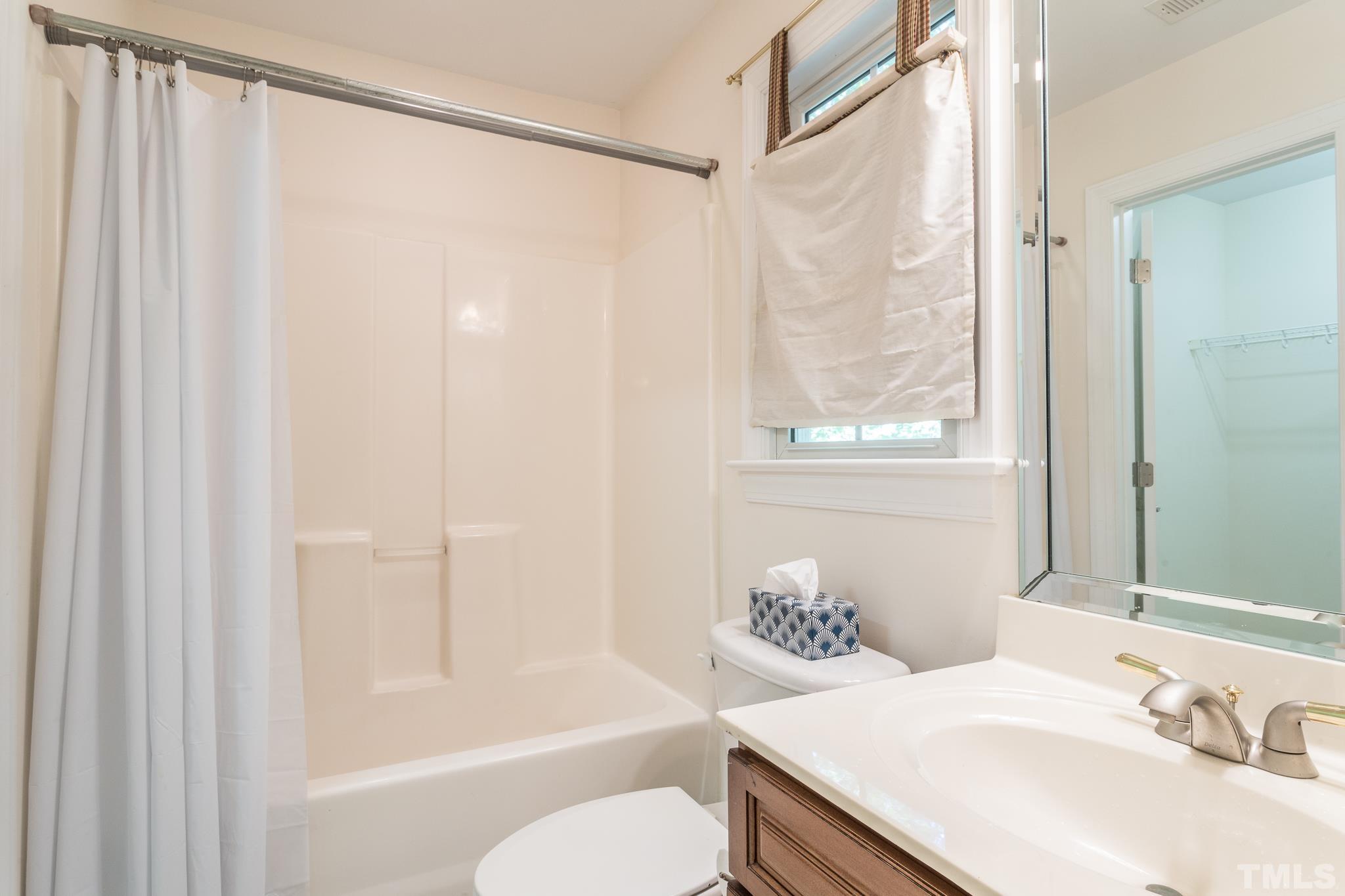 11625 John Allen Road Raleigh, NC 27614 - Photo 5 of 30 a bathroom with a sink toilet and shower