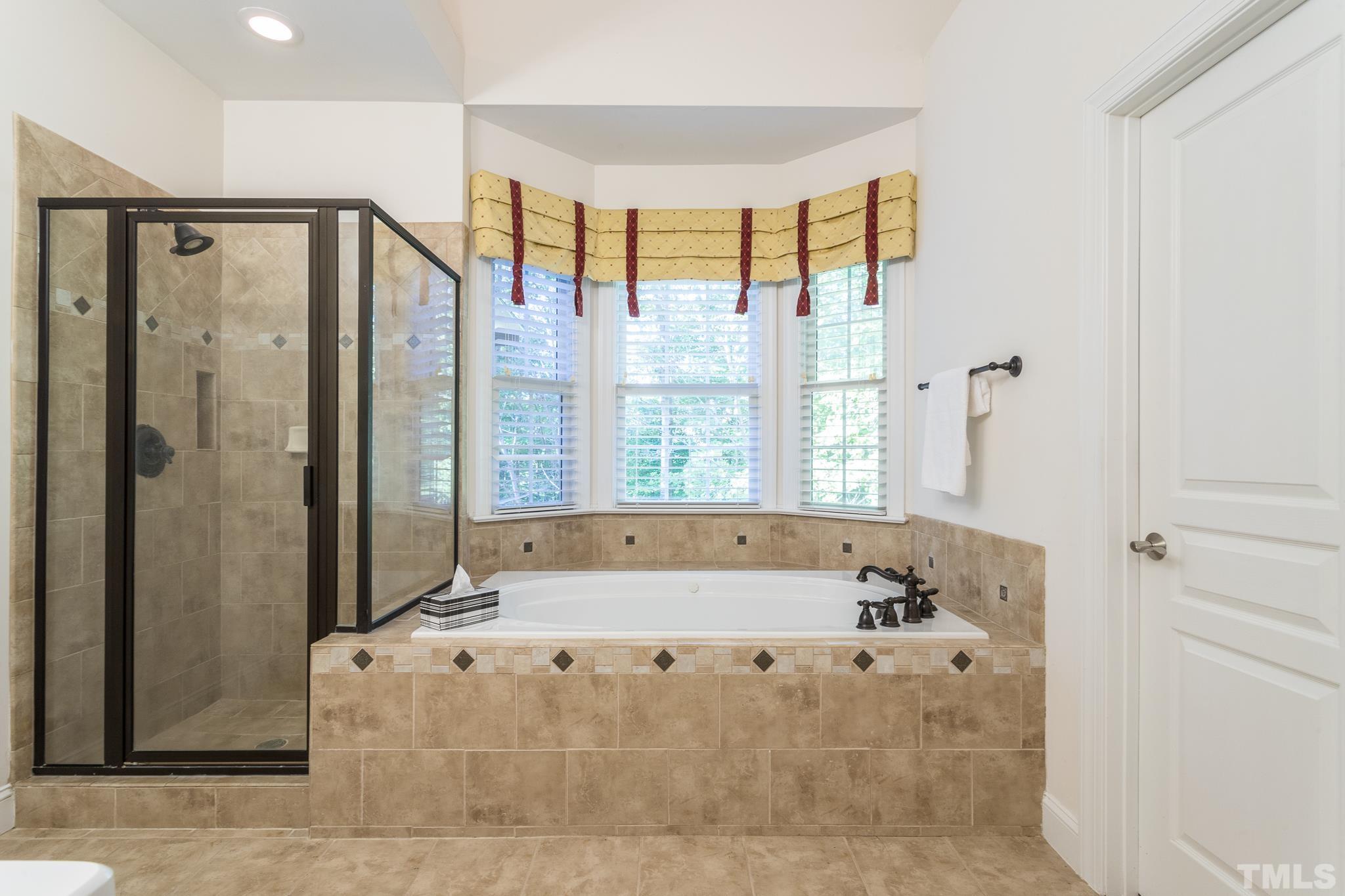 11625 John Allen Road Raleigh, NC 27614 - Photo 7 of 30 a spacious bathroom with a tub and shower