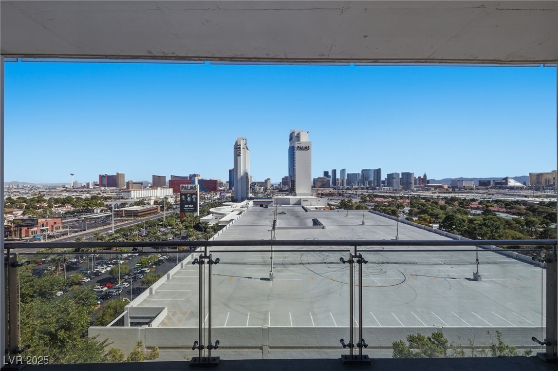 4381 West Flamingo Road, Unit 11308 Las Vegas, NV 89103 - Photo 17 of 26 Balcony featuring a view of skyline