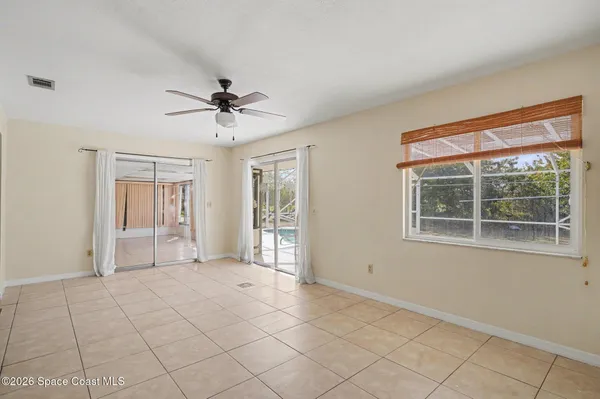 a view of an empty room and window