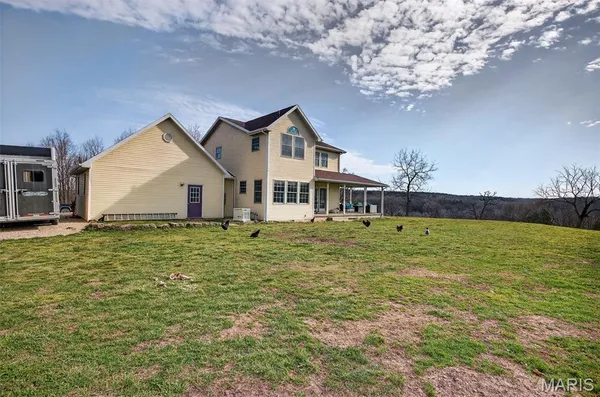 $792,500 | 33992 Garrett Road, Richland, MO 65556