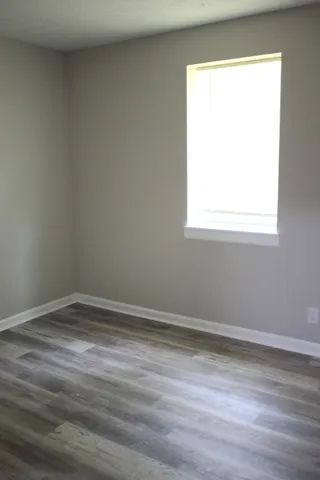 an empty room with a window