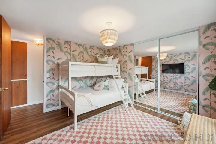 5639 La Jolla Boulevard La Jolla, CA 92037 - Photo 12 of 15 a bedroom with a bed and a view of bathroom