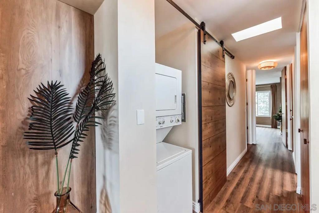 5639 La Jolla Boulevard La Jolla, CA 92037 - Photo 14 of 15 a view of hallway with wooden floor