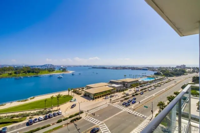 a view of a balcony with city