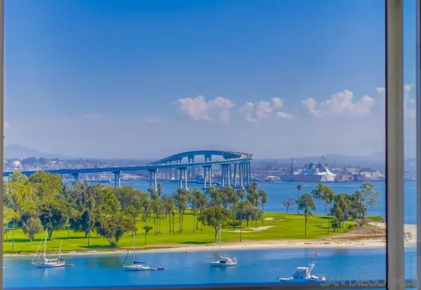 a view of a swimming pool with a yard