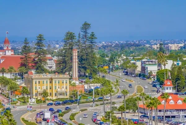 a view of a tall building with a street