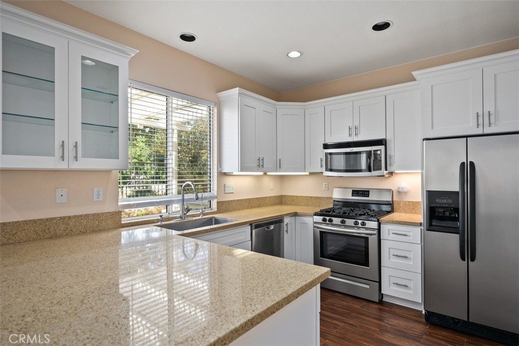 9 Acorn Ridge Rancho Santa Margarita, CA 92688 - Photo 16 of 39 Here is a look of the remodeled kitchen with granite countertops. You even have an amazing view fro the kitchen sink