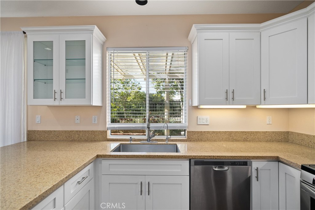 9 Acorn Ridge Rancho Santa Margarita, CA 92688 - Photo 18 of 39 The kitchen has stainless steel appliances