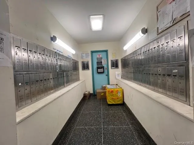 a view of a hallway with the glass door