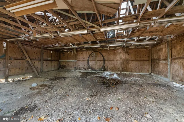 a view of a room with wooden racks