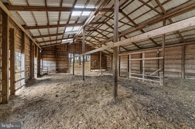 a view of a room with wooden walls