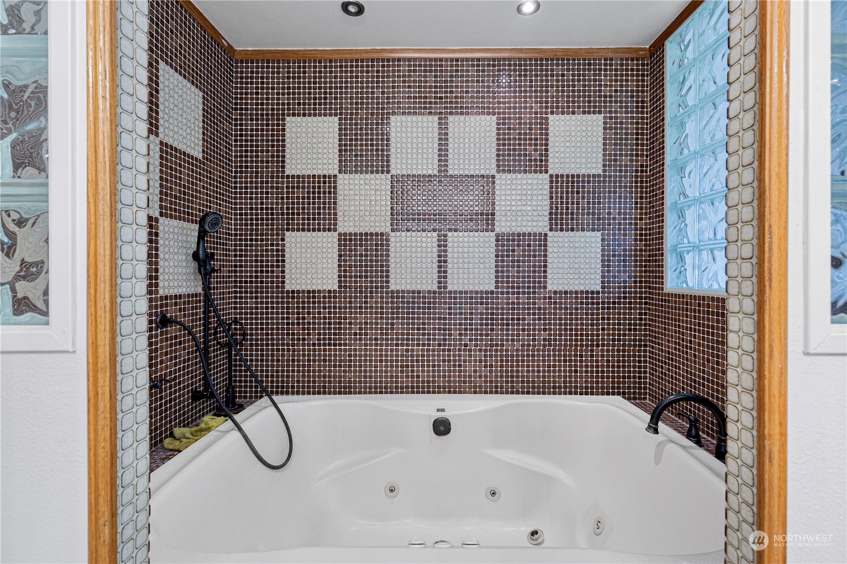 25706 35th Place South Kent, WA 98032 - Photo 15 of 35 a bathroom with a bathtub