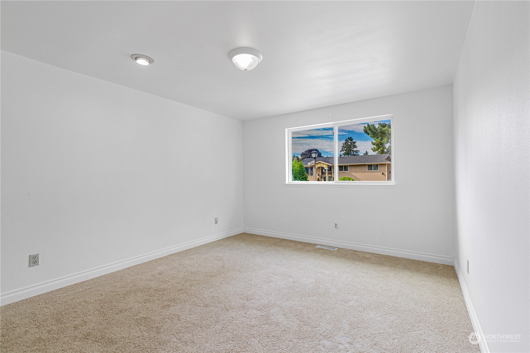 25706 35th Place South Kent, WA 98032 - Photo 19 of 35 an empty room with windows