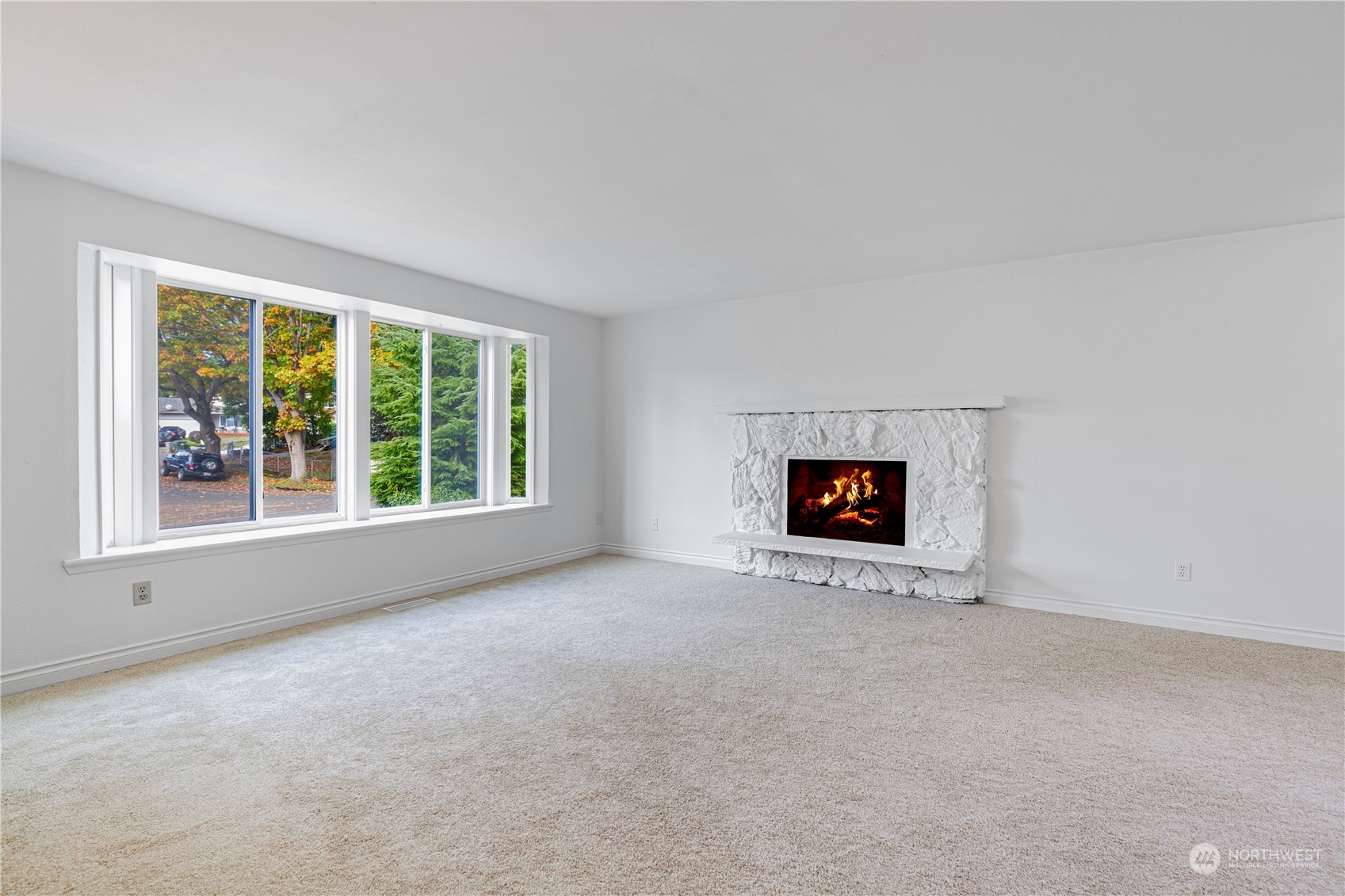 25706 35th Place South Kent, WA 98032 - Photo 2 of 35 an empty room with a window