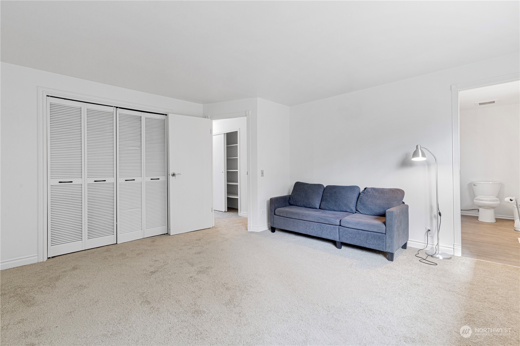 25706 35th Place South Kent, WA 98032 - Photo 21 of 35 a living room with furniture and a ceiling fan