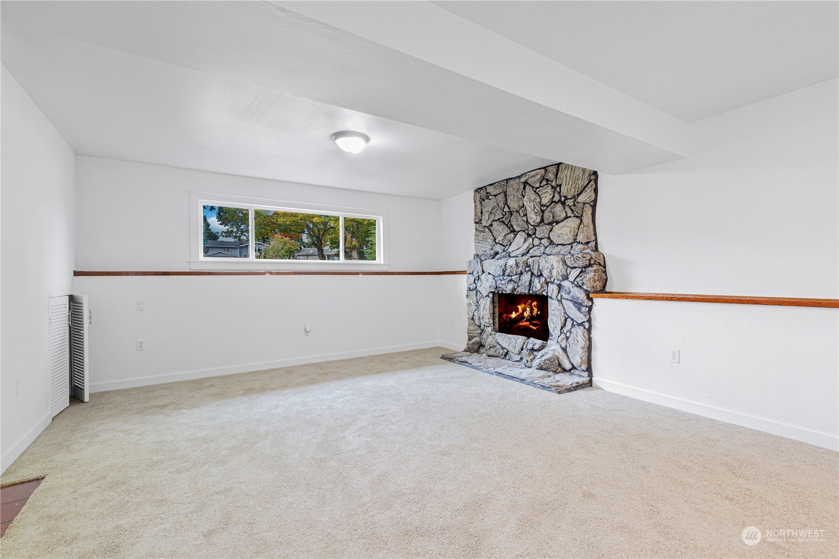 25706 35th Place South Kent, WA 98032 - Photo 22 of 35 an empty room with windows and fireplace