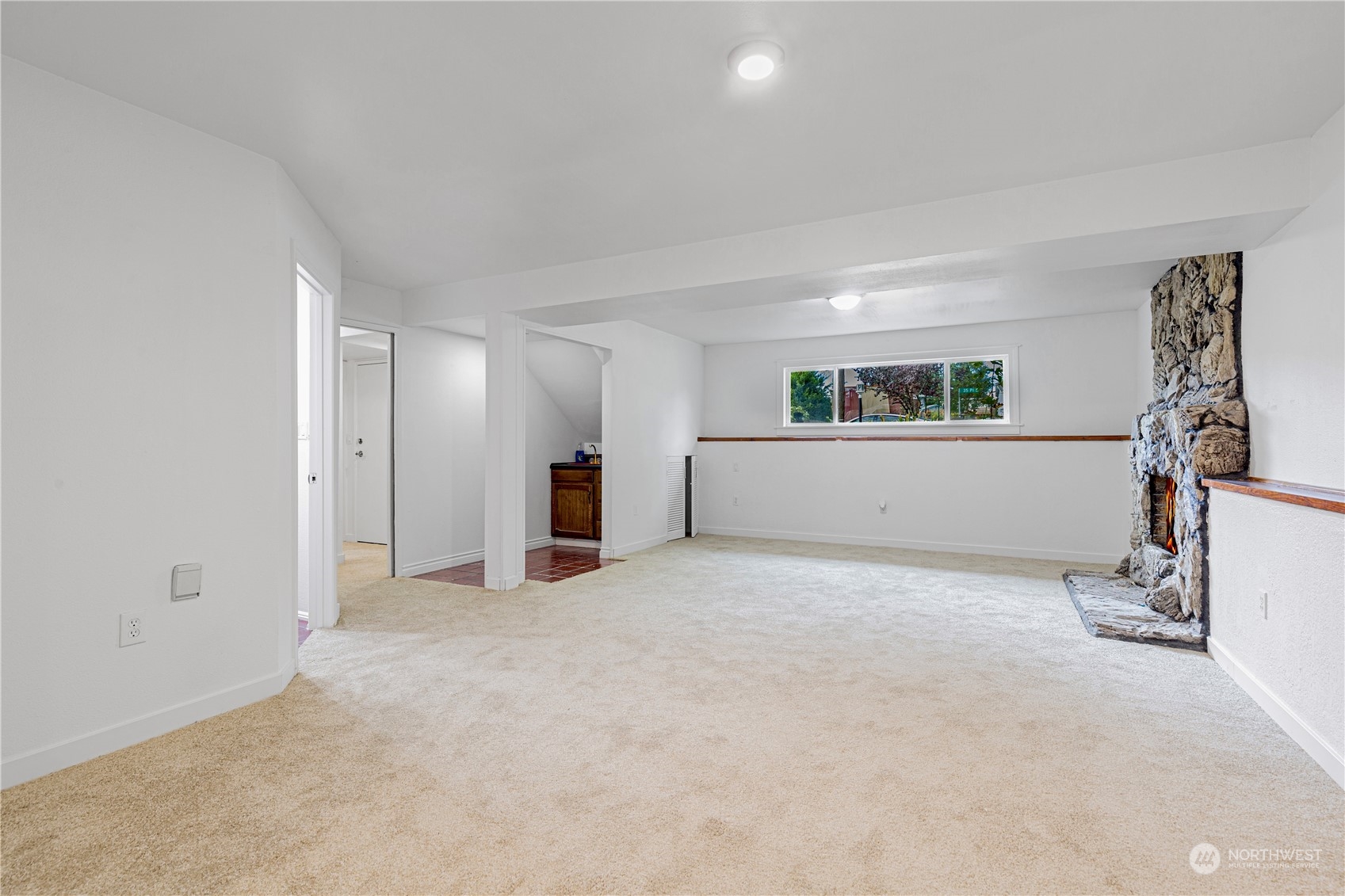 25706 35th Place South Kent, WA 98032 - Photo 27 of 35 a view of empty room with a fireplace