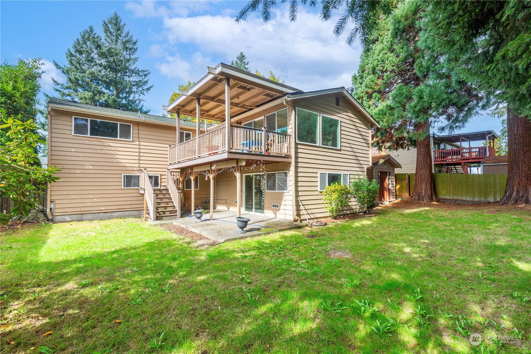 25706 35th Place South Kent, WA 98032 - Photo 32 of 35 a front view of a house with a yard