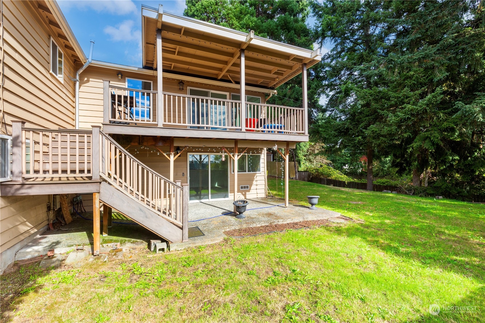 25706 35th Place South Kent, WA 98032 - Photo 33 of 35 a view of a house with backyard and sitting area