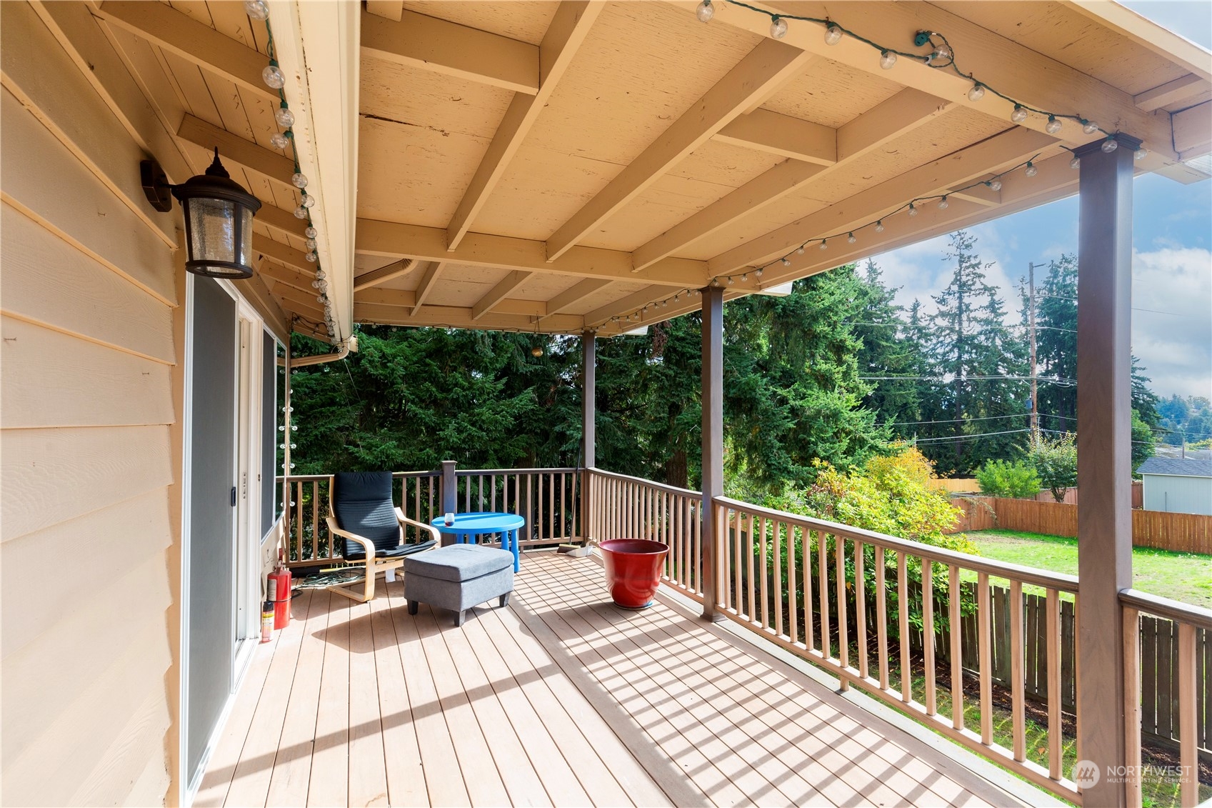 25706 35th Place South Kent, WA 98032 - Photo 34 of 35 a view of balcony with couch and chairs
