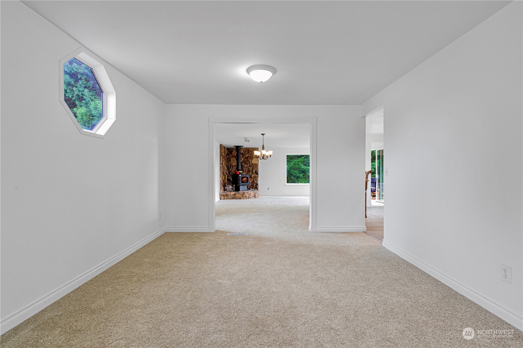 25706 35th Place South Kent, WA 98032 - Photo 6 of 35 an empty room with a window