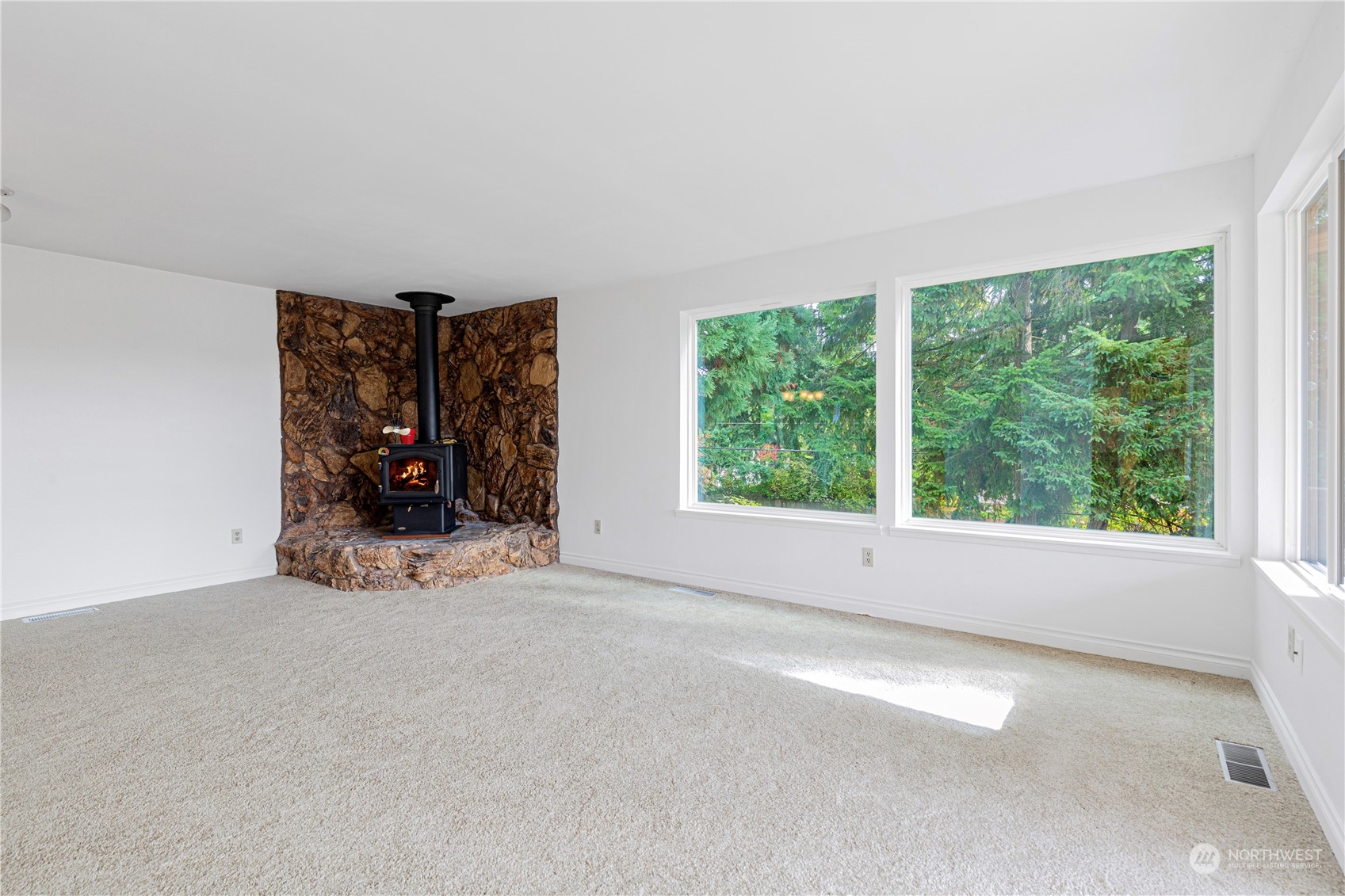 25706 35th Place South Kent, WA 98032 - Photo 9 of 35 an empty room with a large window