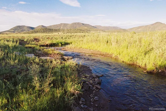 a view of lake with mountain