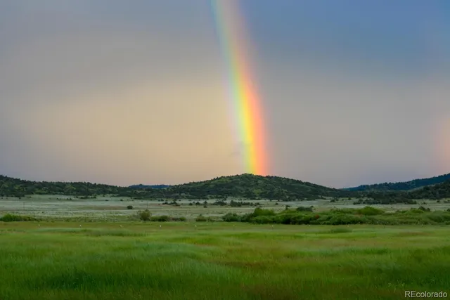 a view of sunset and a mountain