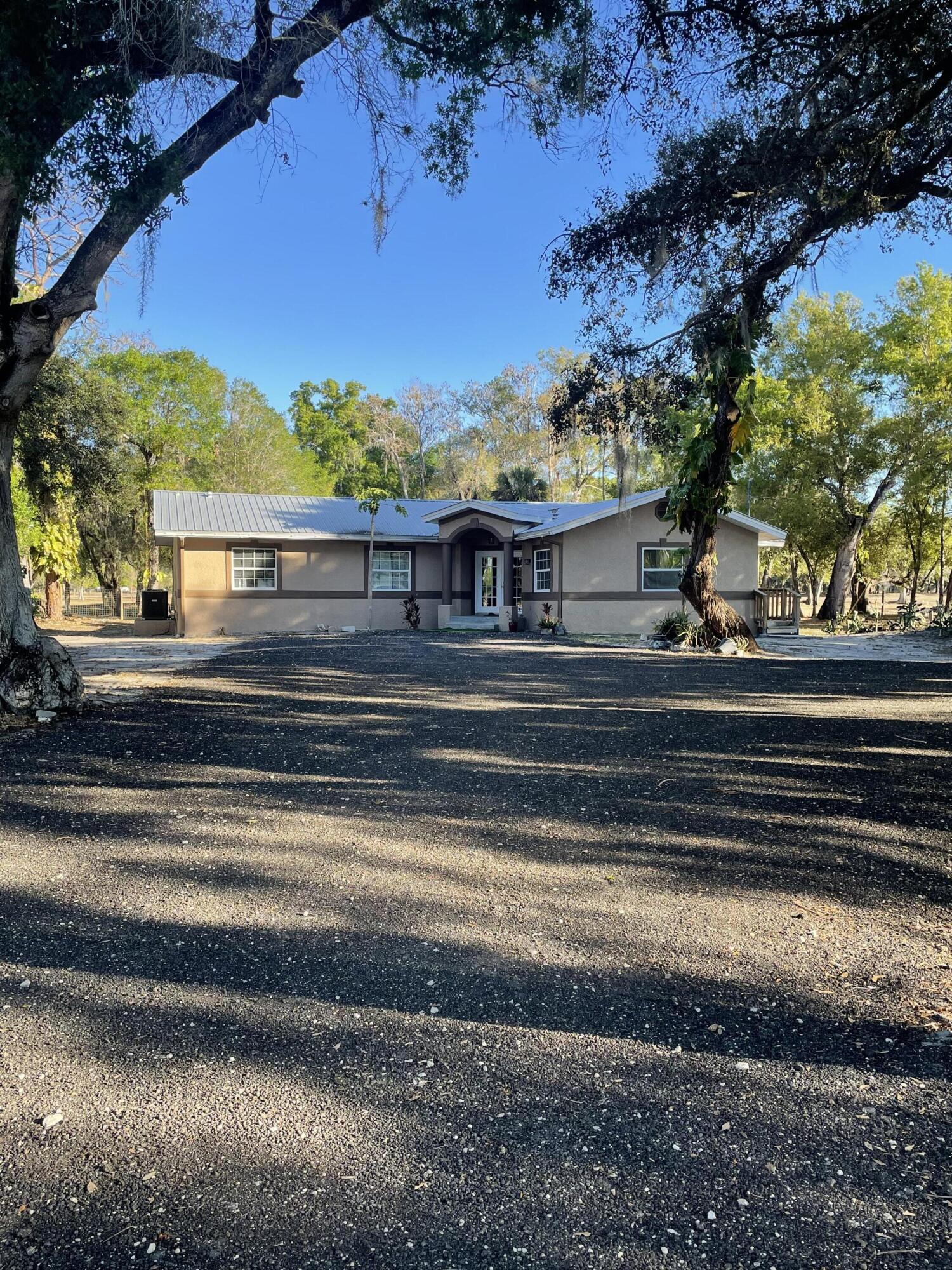 1220 A Road LaBelle, FL 33935 - Photo 34 of 42 a view of a house with a yard