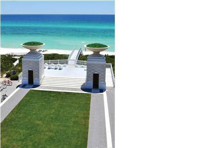 154 Sea Garden Street Inlet Beach, FL 32461 - Photo 1 of 4 a front view of a house with a garden