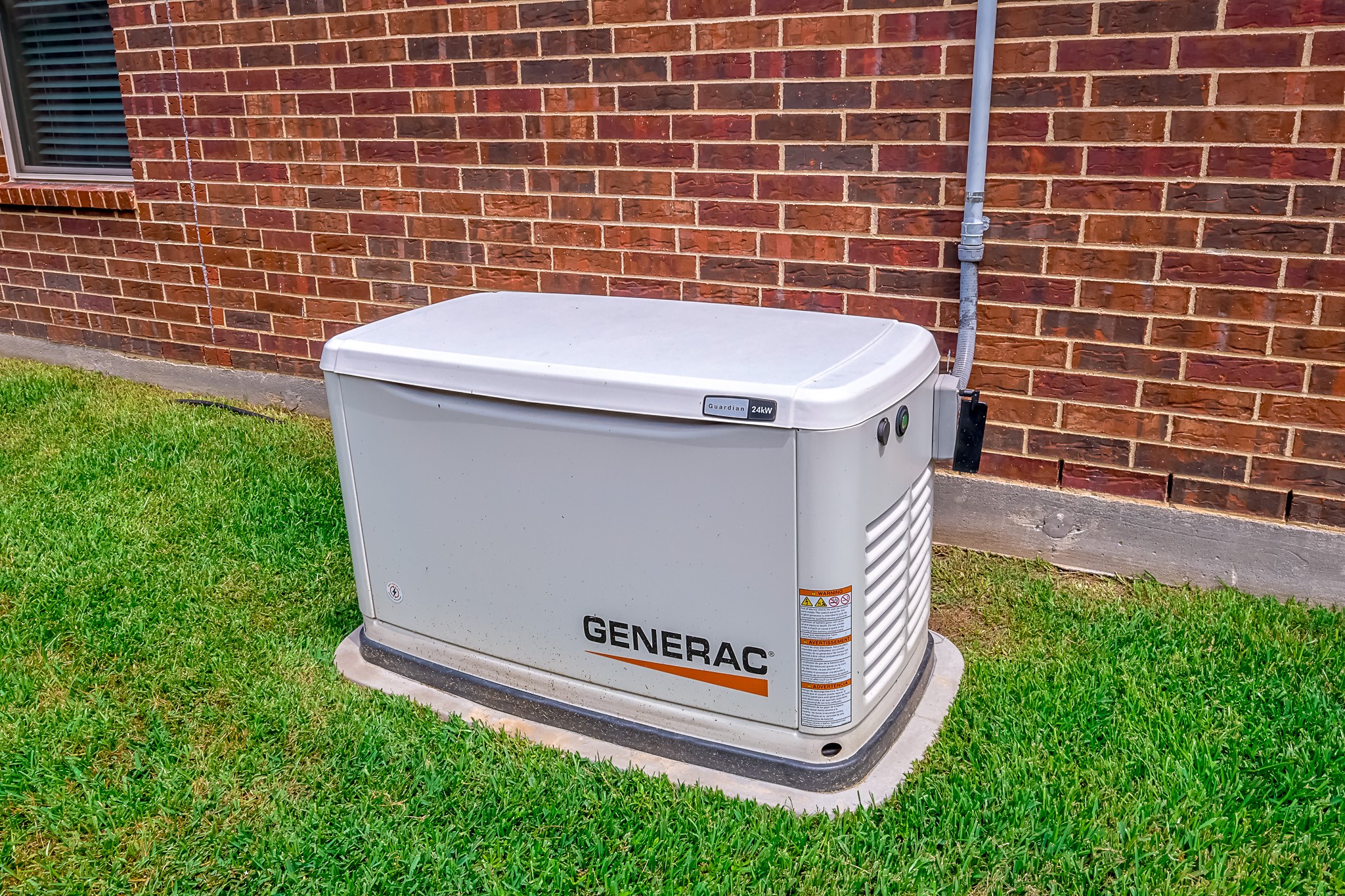 515 Mill Creek Road Pinehurst, TX 77362 - Photo 43 of 48 Generac home backup generator providing reliable emergency power support for the home.