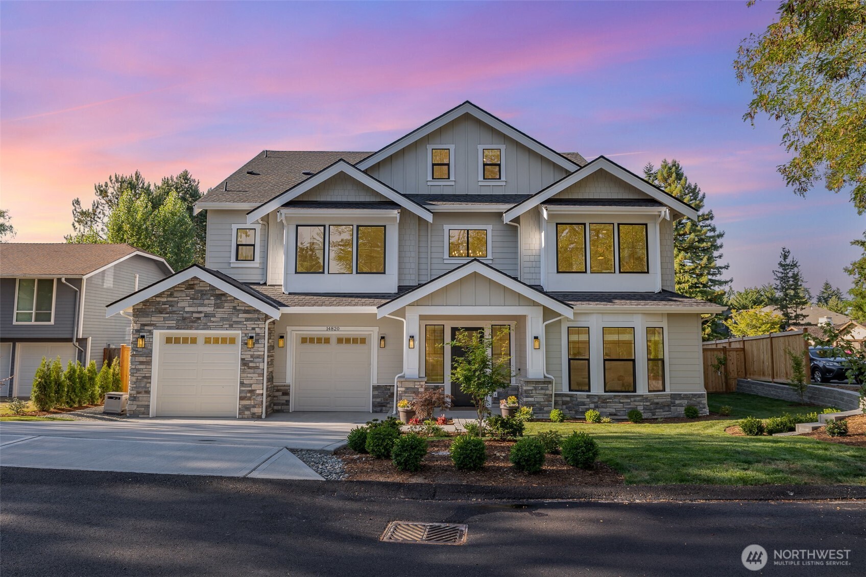 front view of a house with a yard