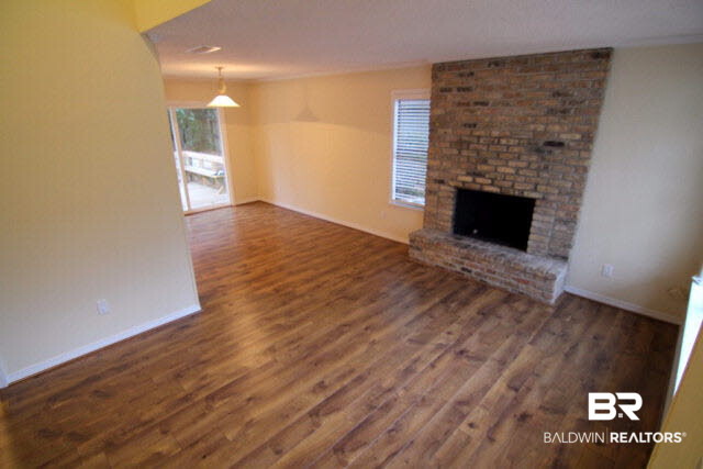 113 Leigh Circle Daphne, AL 36526 - Photo 3 of 14 Great room with a brick fireplace!