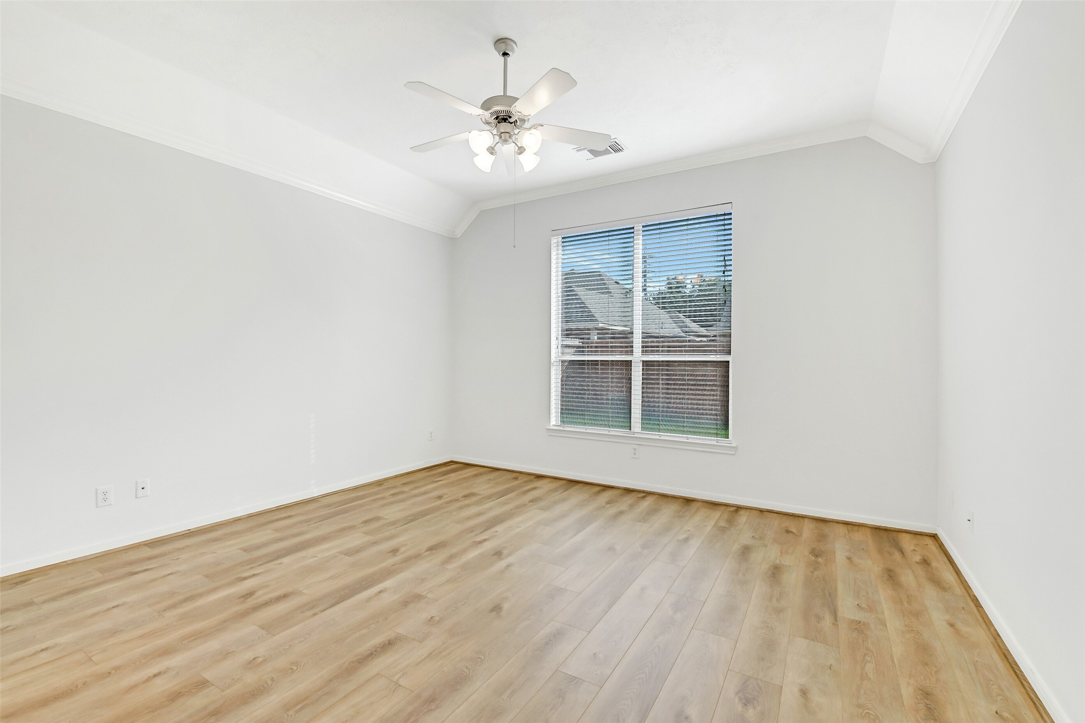 19227 Countryhills Court Spring, TX 77388 - Photo 21 of 33 Primary bedroom has a ceiling fan for added comfort.