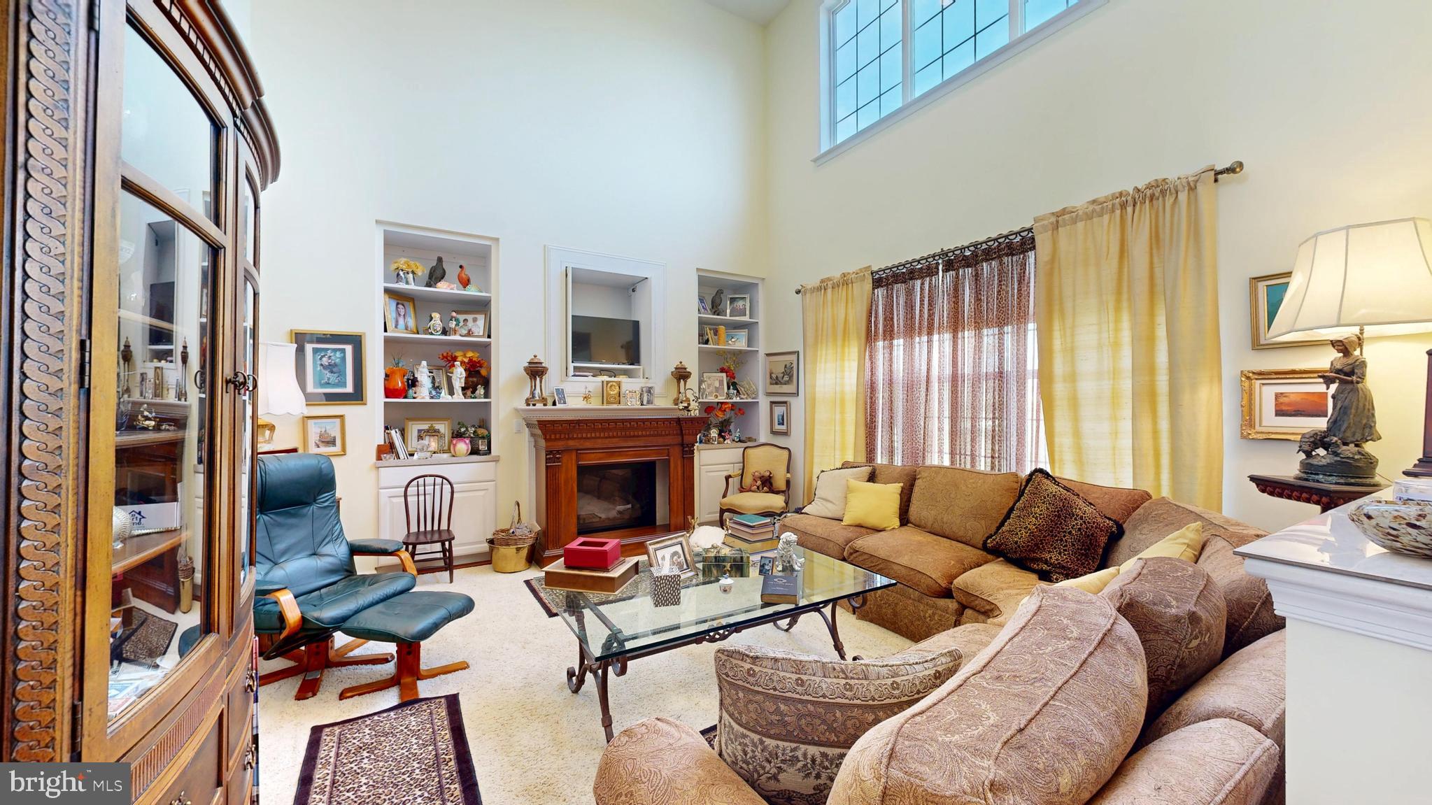 110 Masters Lane Magnolia, DE 19962 - Photo 23 of 65 a living room with furniture fireplace and a large window