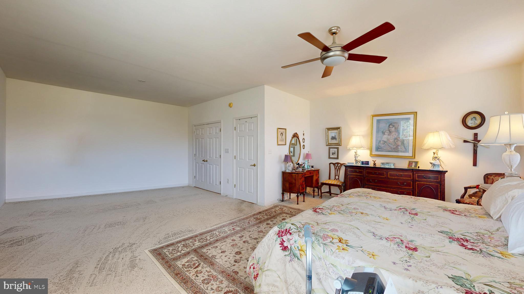 110 Masters Lane Magnolia, DE 19962 - Photo 35 of 65 a bed room with a bed and a ceiling fan
