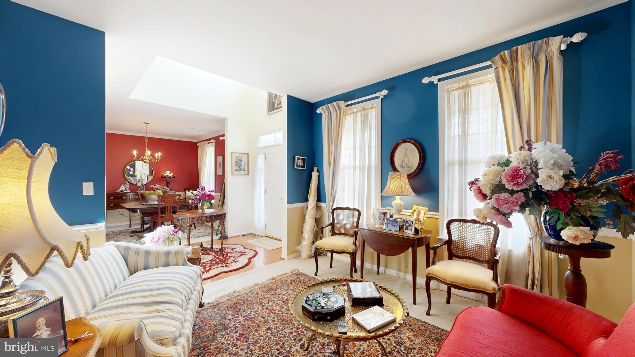 110 Masters Lane Magnolia, DE 19962 - Photo 59 of 65 a living room with furniture chandelier and a large window