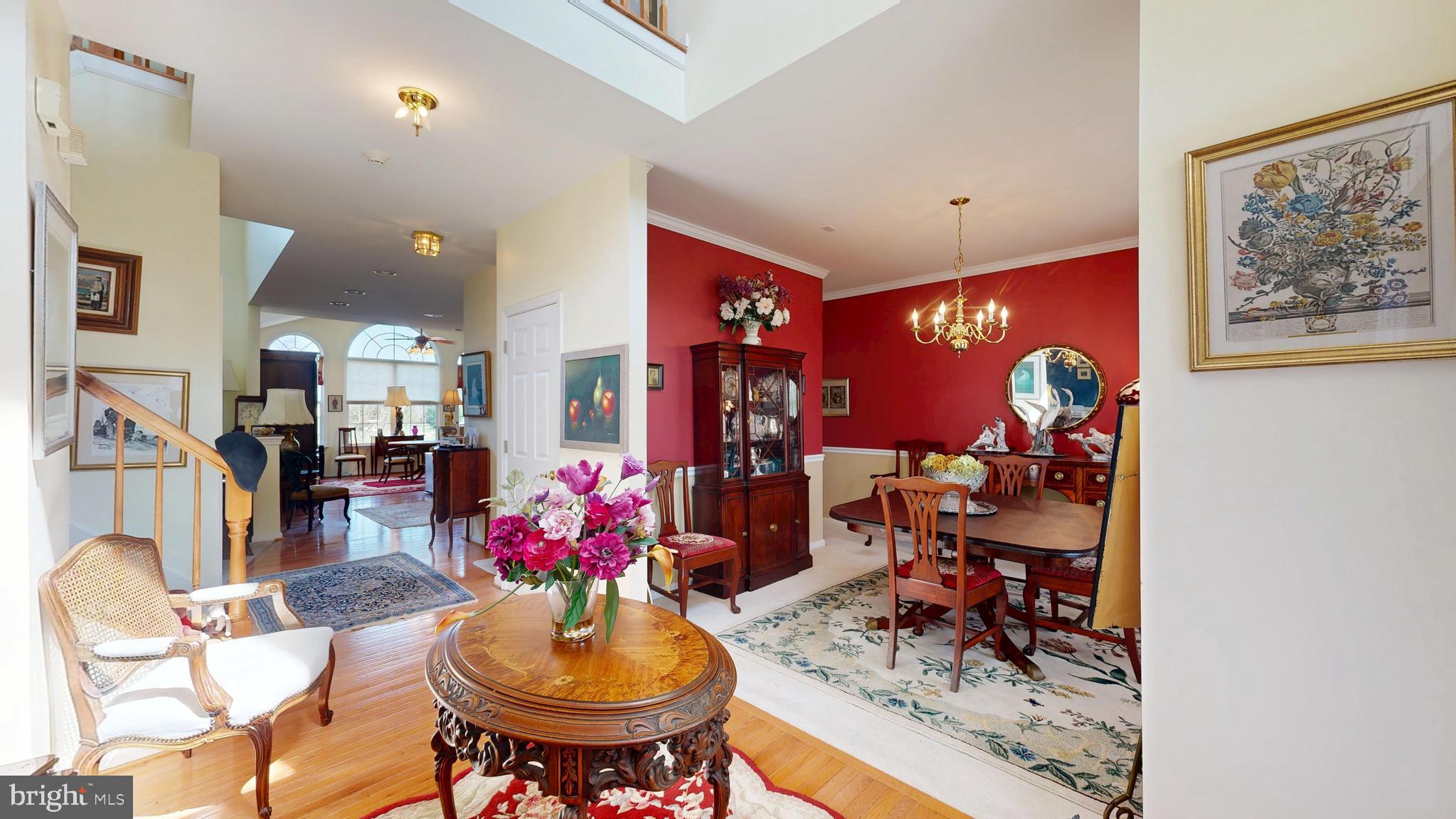 110 Masters Lane Magnolia, DE 19962 - Photo 61 of 65 a living room with furniture and a chandelier
