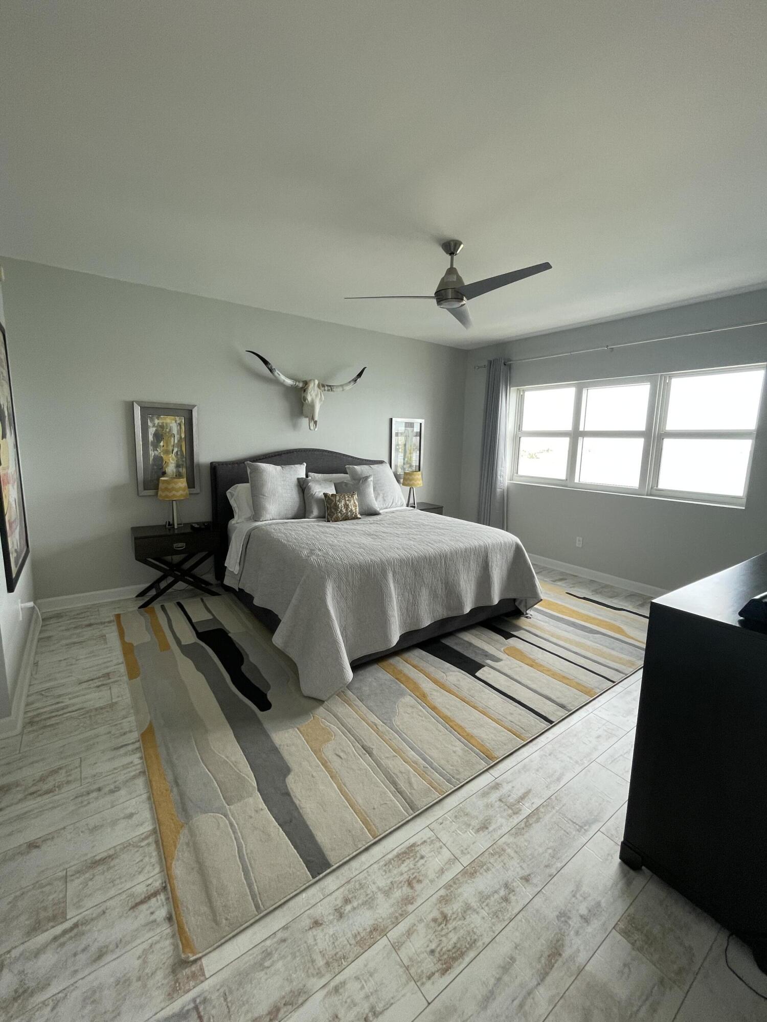 2650 Lake Shore Drive, Unit 902 Riviera Beach, FL 33404 - Photo 13 of 31 Primary Bedroom