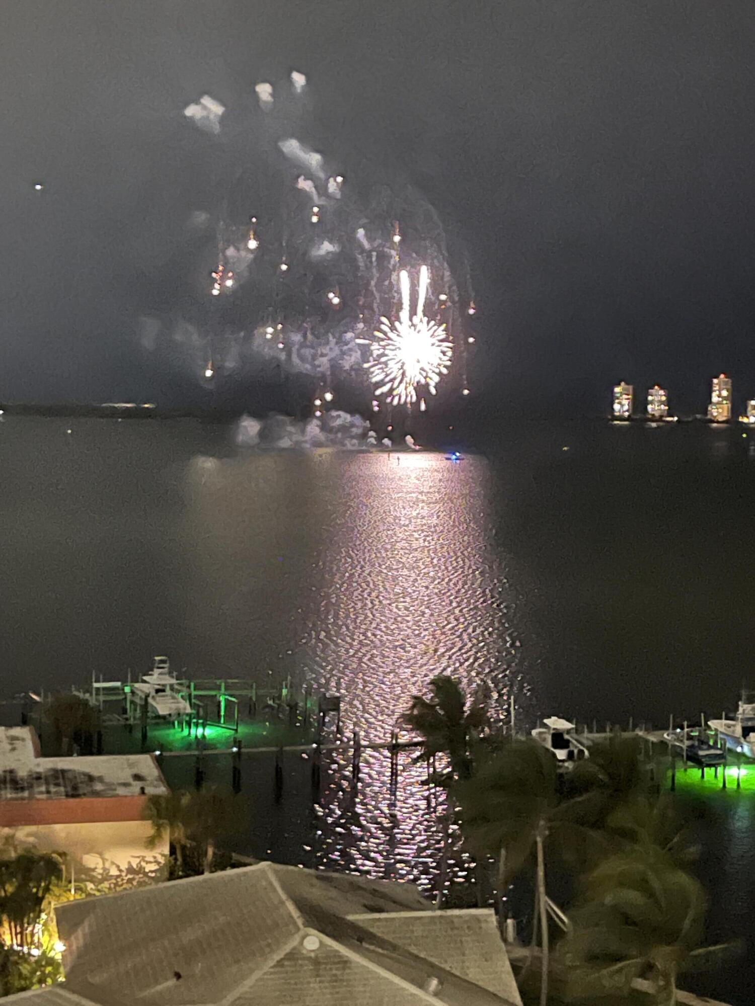 2650 Lake Shore Drive, Unit 902 Riviera Beach, FL 33404 - Photo 31 of 31 Night Fireworks View from Balcony