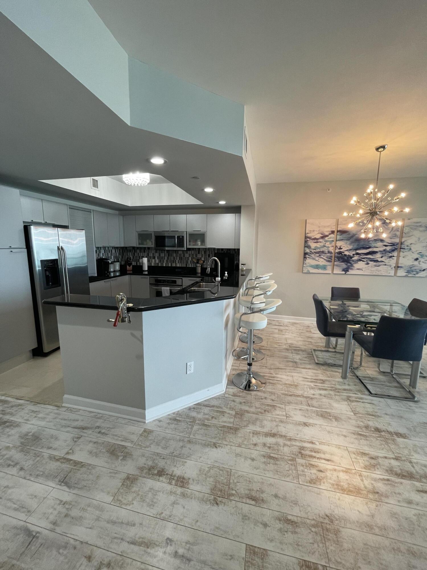 2650 Lake Shore Drive, Unit 902 Riviera Beach, FL 33404 - Photo 9 of 31 Kitchen Island